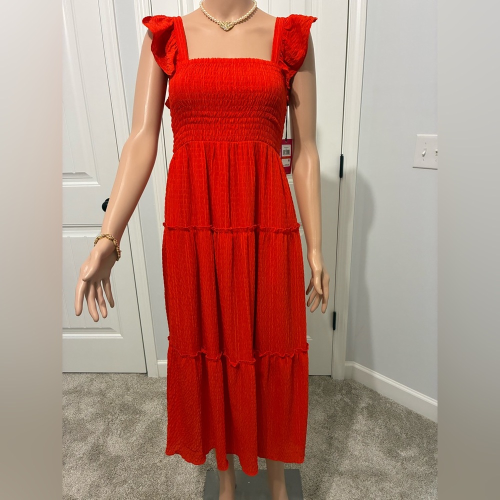 Red Smocked Ruffle Sleeve Dress by Vince Camuto.